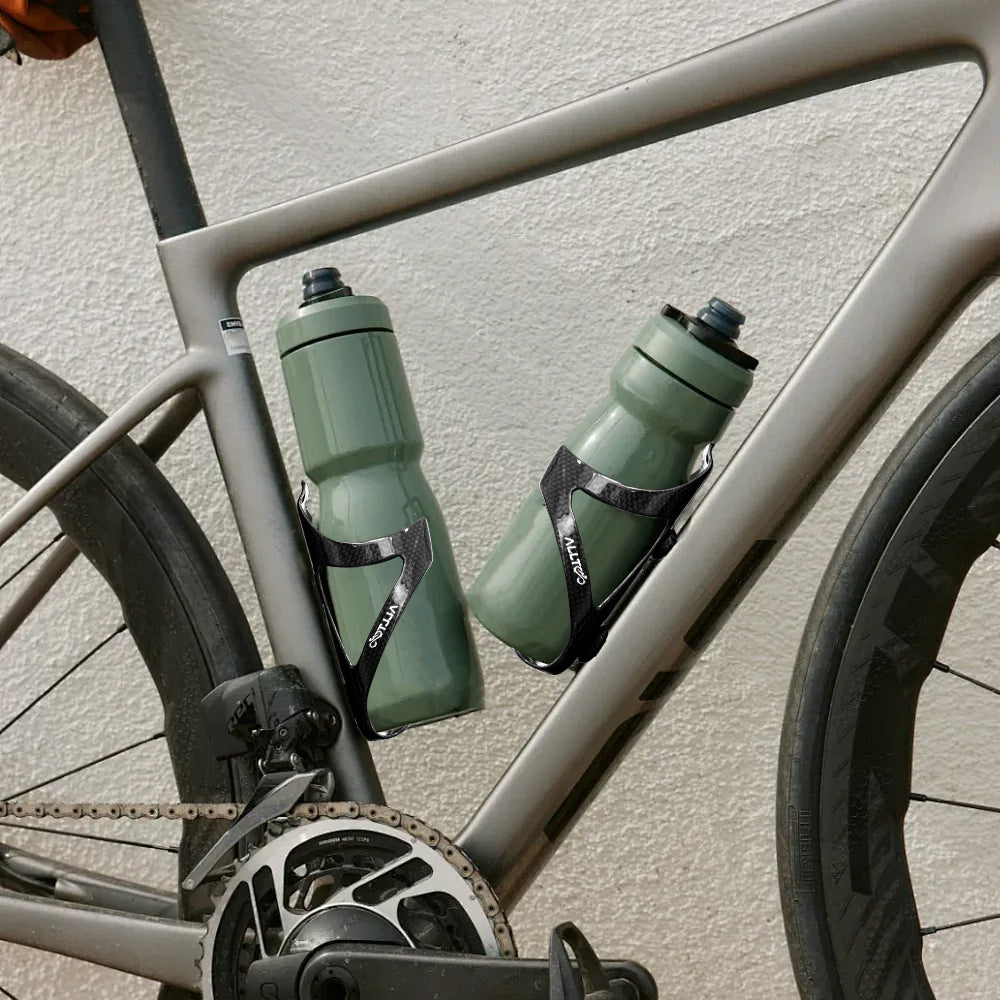 carbon fiber bottle cage mounted on road bike frame